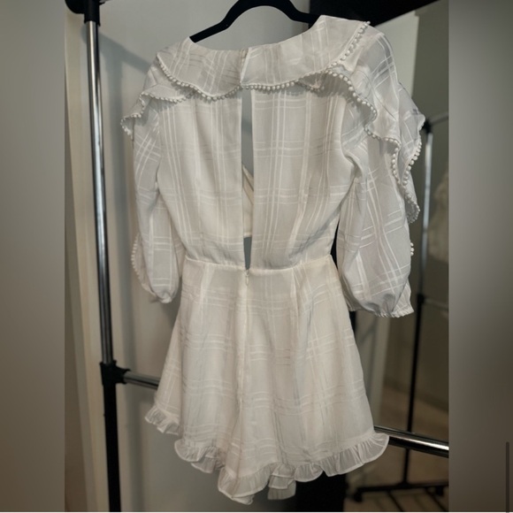 NEVER WORN - Enzo Romper
MAJORELLE
Color: Ivory
Size: S
MAJORELLE - Picture 8 of 12